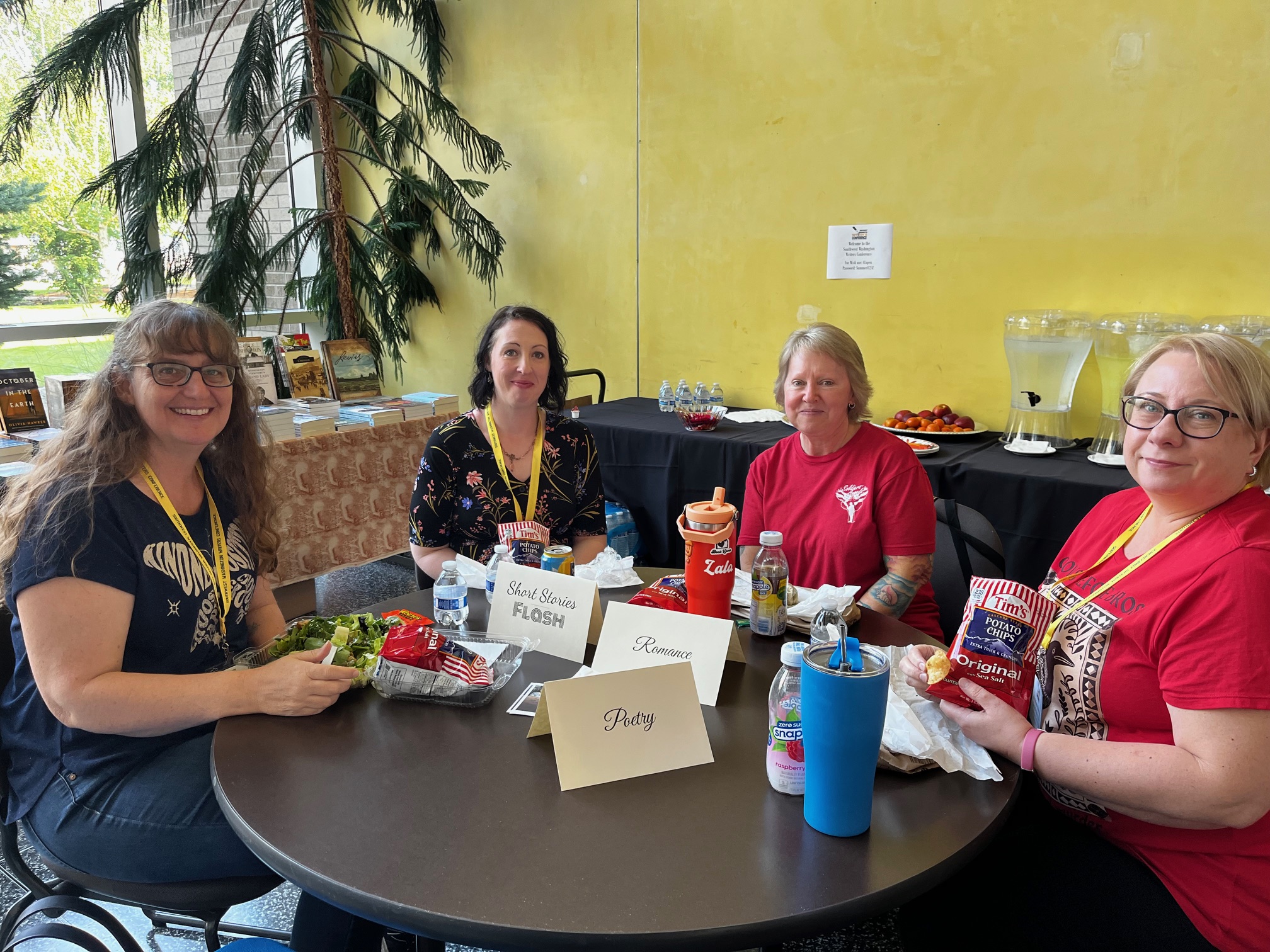 Four attendees participating in SWWC genre lunch